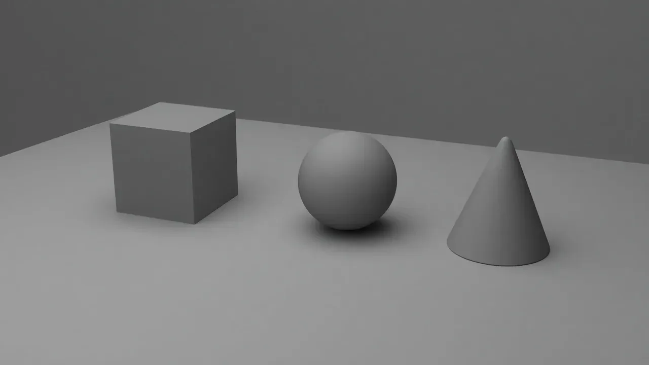 A gray cube, sphere, and cone on a studio floor